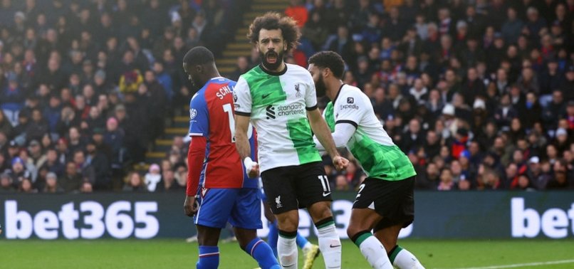 SALAH NETS 200TH GOAL AS LIVERPOOL GO TOP WITH 2-1 WIN OVER 10-MAN PALACE