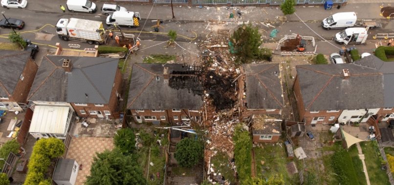 WOMAN FOUND DEAD AT HOUSE DESTROYED IN GAS EXPLOSION IN BRITAIN