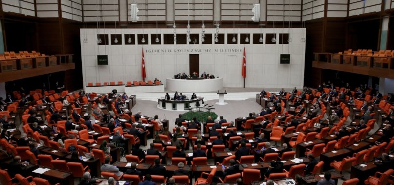 TURKISH PARLIAMENT STRIPS STATUS OF THREE OPPOSITION MPS
