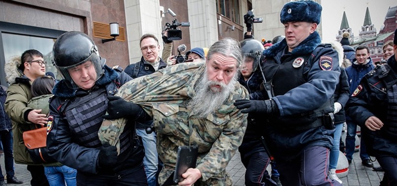 RUSSIAN POLICE DETAIN 380 AT ANTI-PUTIN PROTESTS: MONITORS