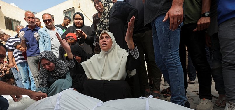 DOZENS OF PALESTINIANS KILLED IN ISRAELI RAIDS ON GAZA STRIP