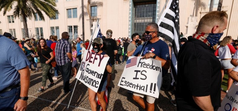 US CORONAVIRUS DEATH TOLL HITS 200,000