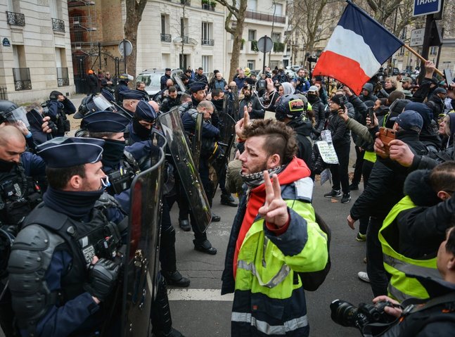 Tensions rise at protest against pension reform in Paris