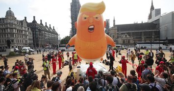 Trump opponents inflate 'Trump Baby' blimp beside British parliament
