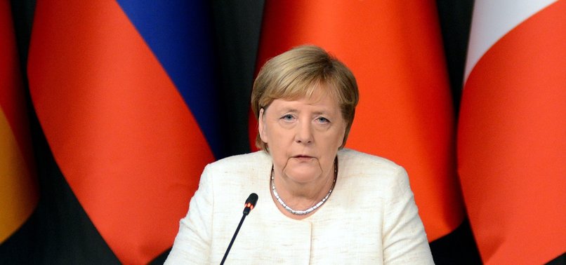ANGELA MERKEL SAYS MUST ULTIMATELY AIM FOR ELECTIONS IN SYRIA