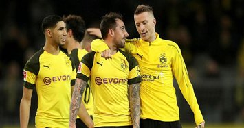 Leaders Dortmund made to sweat for 2-0 win over Freiburg