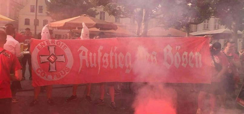 POLICE TO INVESTIGATE GERMAN FOOTBALL CLUB FANS FOR WEARING KU KLUX KLAN-STYLE HOODS