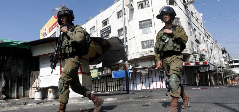 ISRAELI ARMY ARRESTS PALESTINIAN JOURNALIST IN RAMALLAH