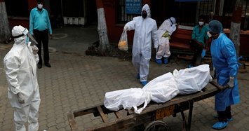 India's coronavirus death toll hits 20,000 as infections surge
