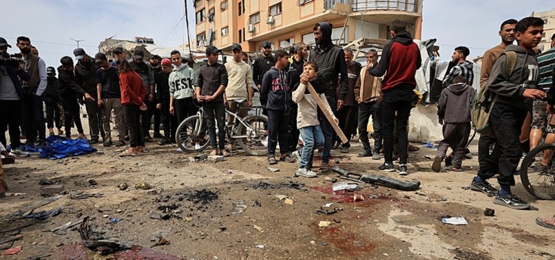 ISRAELI FIRE KILLS 3 PALESTINIANS IN GAZA, DEATH TOLL TOPS 72,300