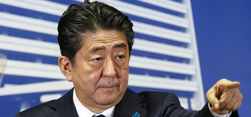 JAPAN PM ABE PROMISES TO FEND OFF NORTH KOREA