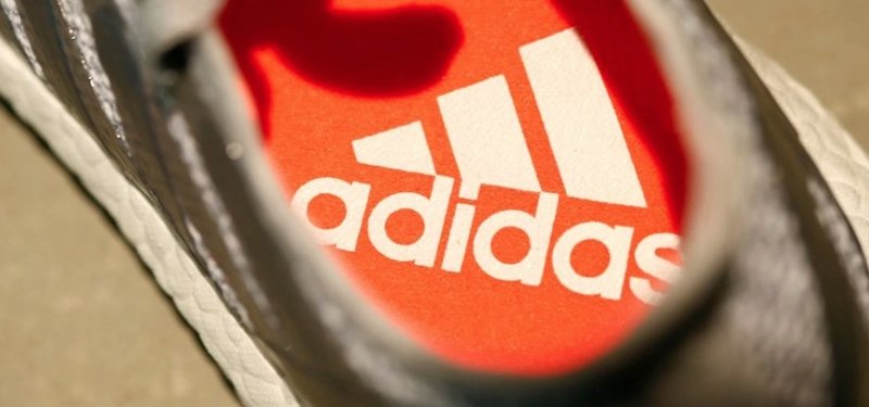 Adidas halves FY income outlook after Kanye West split