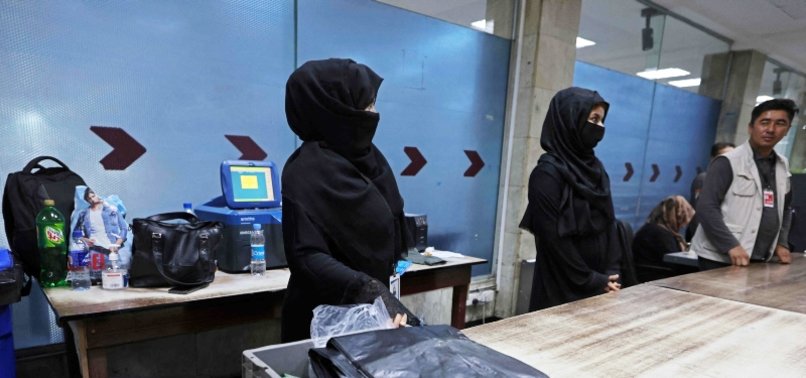 KABUL AIRPORT WOMEN BRAVE FEARS TO RETURN TO WORK