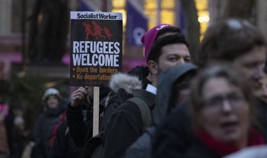 'Refugees are welcome here': Hundreds rally against UK asylum bill in London