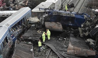 Police carry out search at Larissa station after Greek train crash
