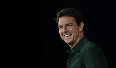 Tom Cruise unveils 'Top Gun' sequel with mid-air stunt