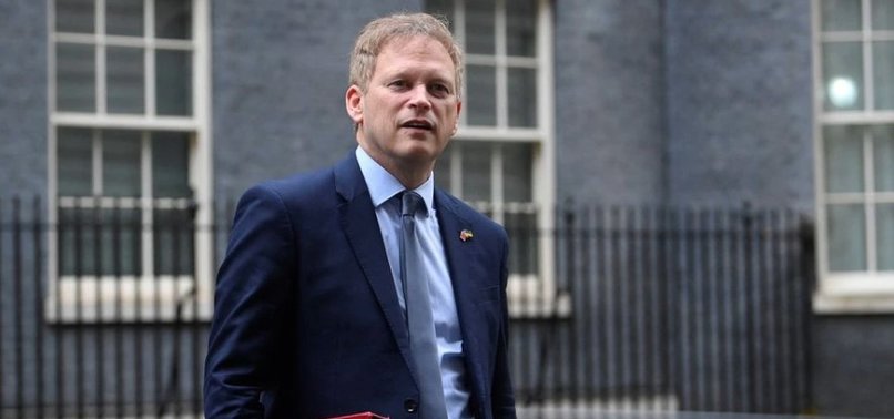UK MINISTER: NO EXCUSE FOR CHINESE POLICE BEATING JOURNALISTS