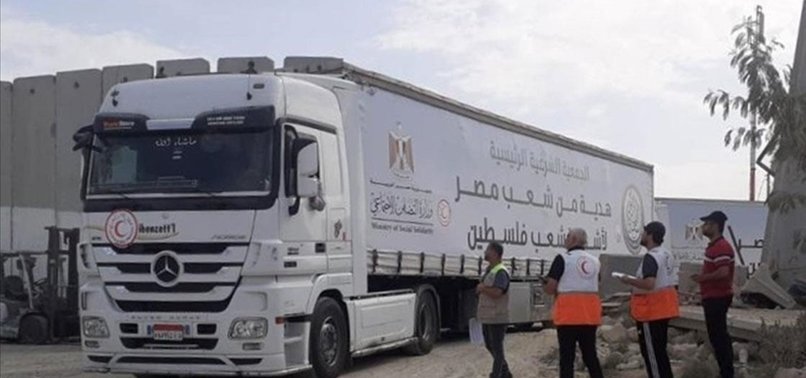 PALESTINE RED CRESCENT SAYS 65 AID TRUCKS ENTERED GAZA CITY, NORTH GAZA