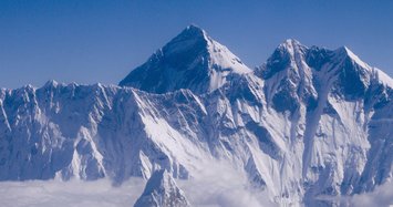 Australian climber breaks record after reaching Everest summit