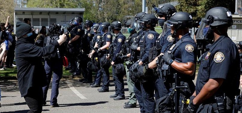 RIOT DECLARED AFTER POLICE KILL MAN IN OREGON PROTESTS