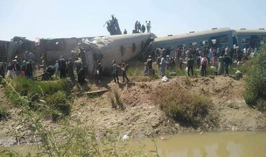 Trains collide in southern Egypt, killing at least 32