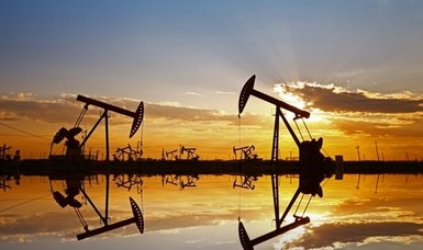 Oil down as US crude stocks rise, COVID cases surge