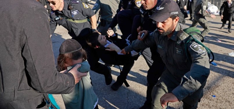 JEWISH WORSHIPPERS CLASH WITH POLICE AT PILGRIMAGE SITE