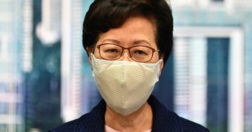 Hong Kong postpones elections by a year, citing coronavirus