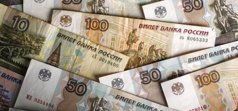 RUSSIAN ROUBLE FALLS AHEAD OF EXPECTED RATE CUT BY CENTRAL BANK