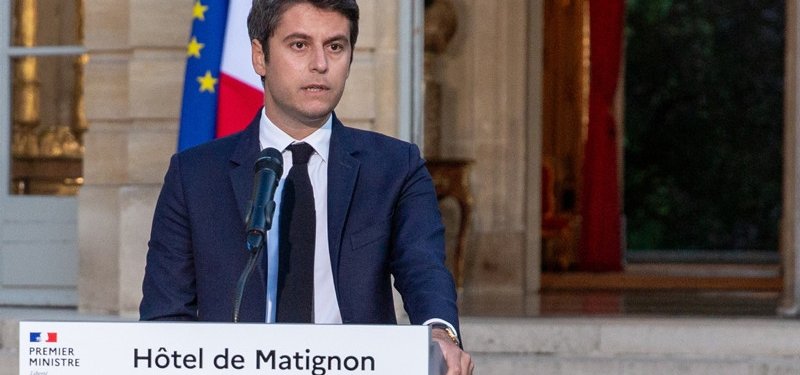 French PM eyes rebuilding political force after party backing