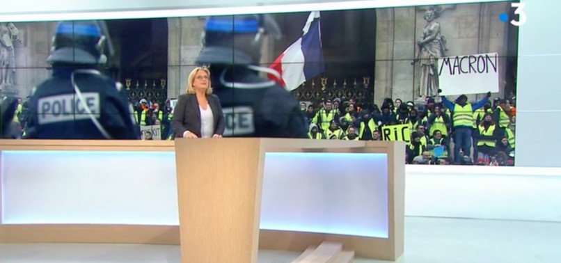 FRENCH TV CHANNEL CENSORS ANTI-MACRON PLACARD WITH PHOTOSHOPPED IMAGE