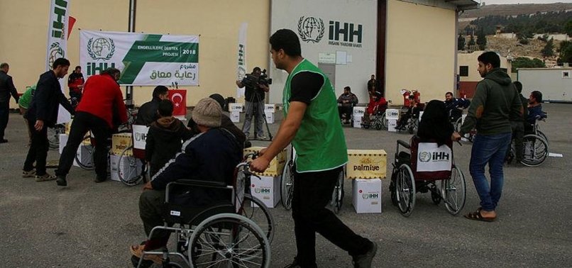 TURKISH AID GROUP DISTRIBUTES WHEELCHAIRS IN SYRIA