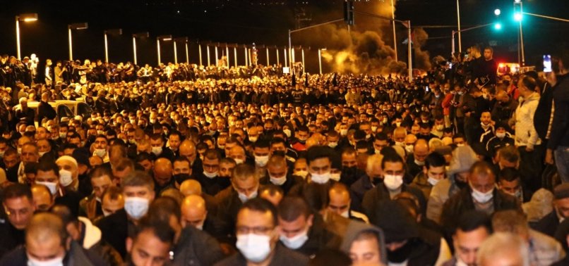 THOUSANDS OF ARABS TAKE TO STREETS TO PROTEST ISRAELI POLICE KILLINGS