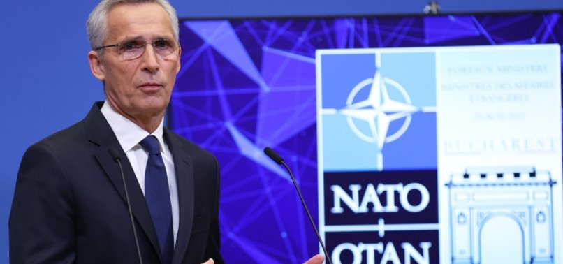 NATO HEAD PRAISES GERMAN SUPPORT FOR UKRAINE BEFORE BUCHAREST MEETING