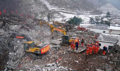 Death toll in China landslide rises to 20, rescuers still search for missing