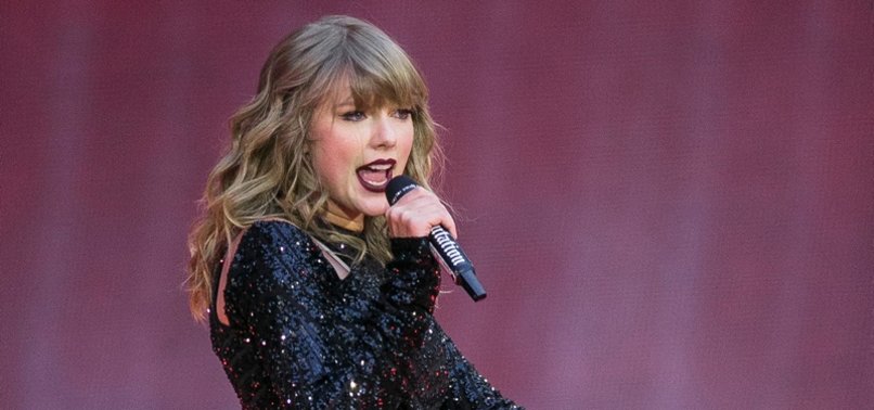 TAYLOR SWIFT SURPRISES FANS WITH ANOTHER ALBUM DUE TONIGHT