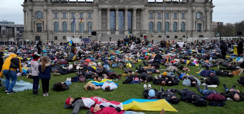 THOUSANDS LIE DOWN IN BERLIN TO DEMAND BAN ON RUSSIAN OIL AND GAS