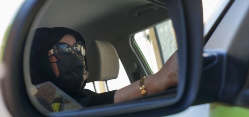 SAUDI WOMEN DRIVE FOR EXTRA CASH AS COSTS CLIMB