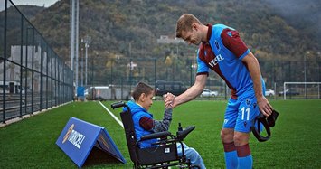 Disabled kids surprise Trabzonspor team with drawings