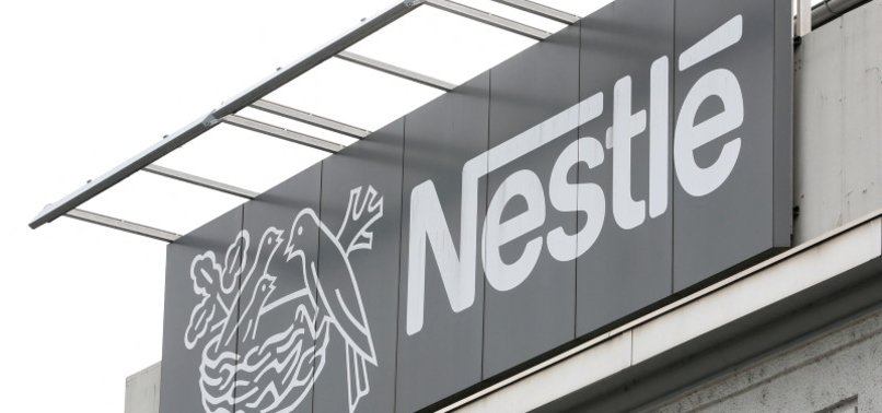 NESTLE SALES SLIP AS SHOPPERS ARE PUT OFF BY PRICE HIKES