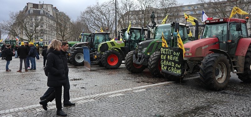 TRACTORS ROLL INTO PARIS AS FARMERS UP PRESSURE ON MACRON