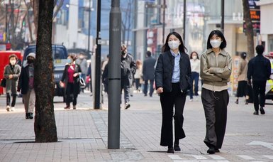 South Korea drops indoor anti-COVID mask mandate, infection fears linger