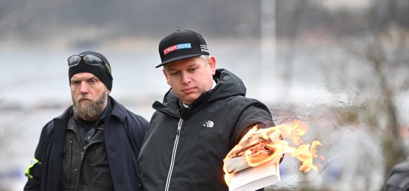 Danish far-right leader Rasmus Paludan burns copy of Quran in Swedish capital Stockholm