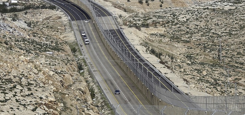ISRAEL OPENS APARTHEID ROAD DIVIDING PALESTINIANS, SETTLERS IN OCCUPIED WEST BANK