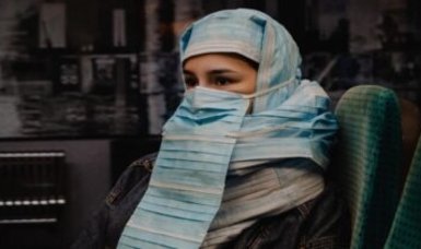 Turkish artist protest burqa ban with surgical masks