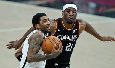 Irving returns, but new-look Nets beaten by Cavs in 2 OTs