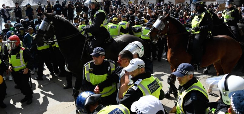 FAR-RIGHT AND ANTI-RACISM PROTESTERS SCUFFLE IN LONDON