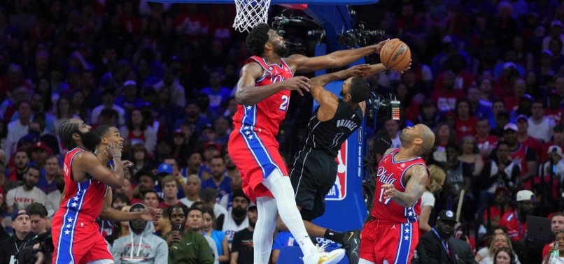 76ERS DRAIN 21 TREYS IN OPENING WIN OVER NETS