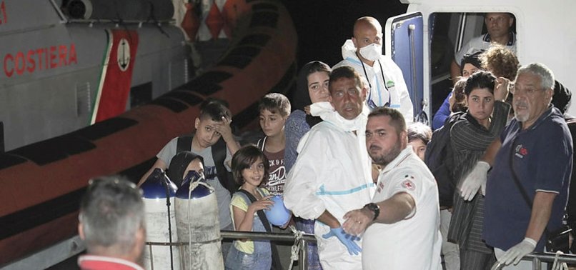 ITALY TRANSFERS MIGRANTS OFF SHIP, BUT REFUSES THEM ENTRY