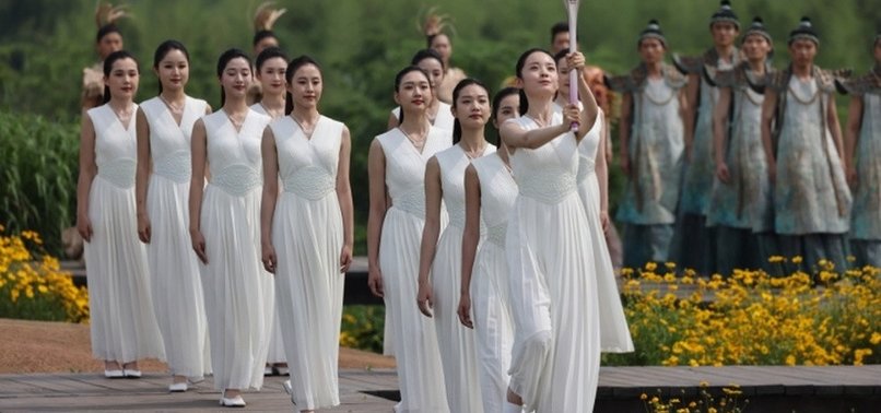 THOUSANDS TURN OUT FOR LAUNCH OF ASIAN GAMES TORCH RELAY IN HANGZHOU